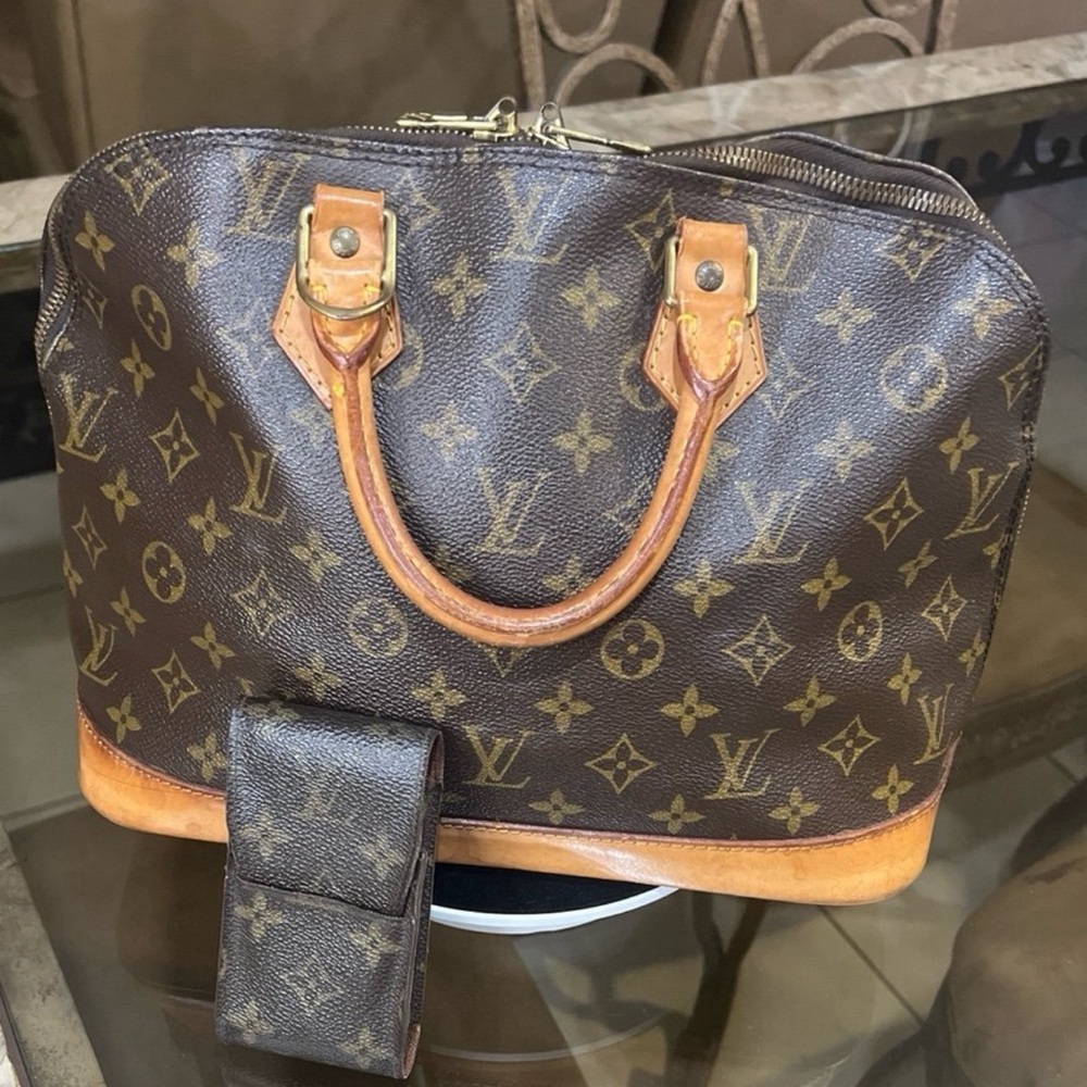 Authentic Louis Vuitton Alma with bonus Lipstick/Cigarette case.